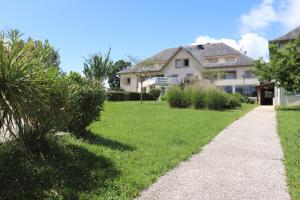 Appartements Residence de la Source by Euclenima : photos des chambres