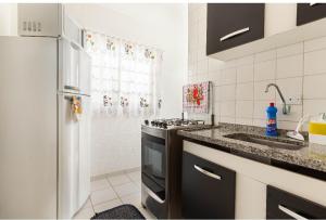 D01 Apto com estacionamento, piscina e churrasqueira