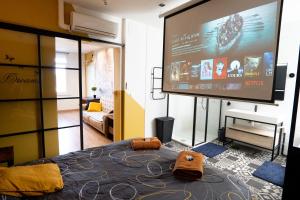 Appartements Capsule Premium balneo & home cinema : Appartement - Non remboursable