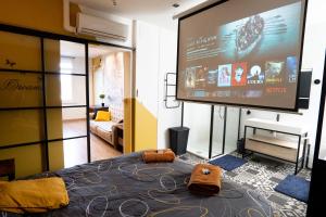 Appartements Capsule Premium balneo & home cinema : photos des chambres