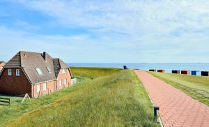 Direkt am Deich - Ferienwohnung Föhr im Gästehaus Am Badedeich