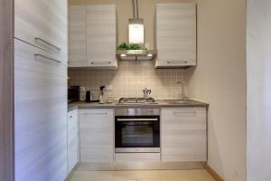 Woodie Apartment by Mamo Florence