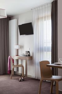 Hotels Neho Suites Porte de Geneve - Gare Annemasse : photos des chambres