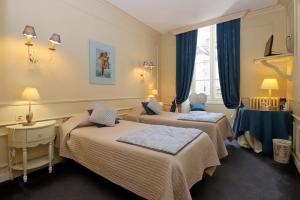 Hotels Le Pavillon Saint-Martin : photos des chambres