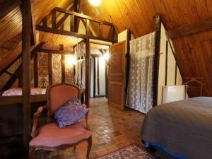 Maisons de vacances Gite Saint-Jouin-de-Blavou, 5 pieces, 8 personnes - FR-1-497-38 : photos des chambres
