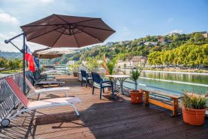 Appartements Appartement d'une chambre avec vue sur le lac terrasse amenagee et wifi a Lyon : photos des chambres