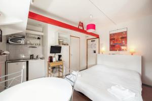 Appartements Appartement d'une chambre avec vue sur le lac terrasse amenagee et wifi a Lyon : photos des chambres