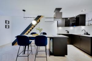 Appartements Le Splendide de Poincare : photos des chambres