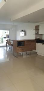 Garden View 2 Dormitorios con Jardín y Parrillero hasta 7 personas