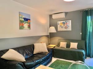 Appartements Blagnac : appartement T2 avec jardin, parking et climatisation : photos des chambres