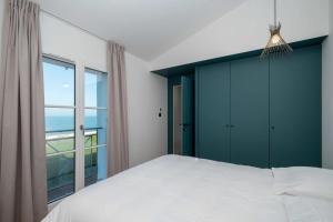 Appartements Cocon vue mer haut standing : photos des chambres