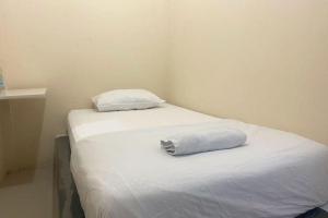 CK Homestay Syariah near Lippo Plaza Jambi Mitra RedDoorz