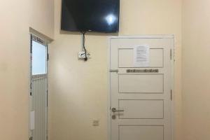 CK Homestay Syariah near Lippo Plaza Jambi Mitra RedDoorz