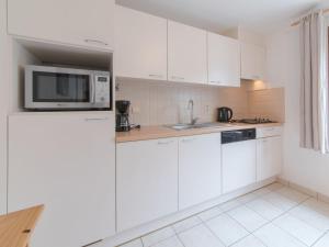 Holiday Home Vissershuisje 9-21 with parking by Interhome