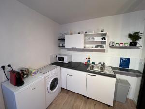 Appartements F2 Av MARX DORMOY CLERMONT CENTRE A : photos des chambres