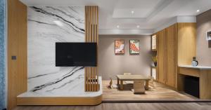 Gamalan FL Spring Hotel - 3hvězdičkové hotely ve městě Ťiao-si