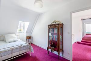 Maisons de vacances Entre mer et foret, grande maison familiale a 230m de la plage de Jospinet : photos des chambres