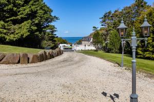 Maisons de vacances Entre mer et foret, grande maison familiale a 230m de la plage de Jospinet : photos des chambres