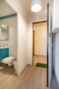 Appartements studio cosy proche du centre + parking gratuit : photos des chambres