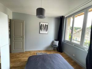 Appartements Logement neuf a Brive avec terrasse pres du centre-ville et de la Gare, avec Netflix Fibre et Stationnements gratuits : photos des chambres