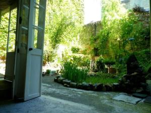 Appartements Le Jardin Antique : photos des chambres