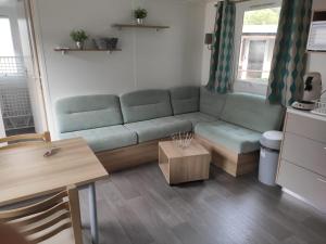 Campings Le 384 mobil home Clim : photos des chambres