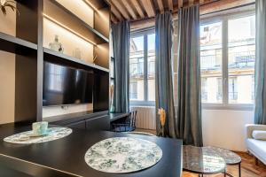 Appartements SWEET LEONE JACUZZI PLACE TERREAUX : photos des chambres