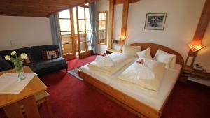 Family Room (2 Adults + 2 Children) room in Hotel Alpin