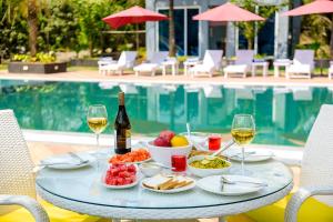 SaffronStays Palm Paradise - twin 3BR villas with pool, slides, mango plantations & outdoor games near Mumbai