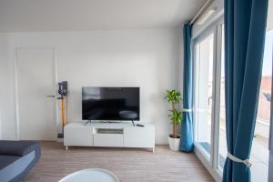 Appartements de 2 ou 3 chambres a 40 minutes de Paris : photos des chambres