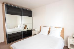 Appartements de 2 ou 3 chambres a 40 minutes de Paris : photos des chambres