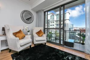 Sky Tower Serenity + Rooftop Pool