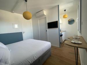 Appartements Demeure Rossini Cholet Centre : photos des chambres
