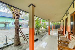 Ekas Beach Guesthouse Mitra RedDoorz