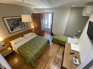 Superior Triple Room room in Artua'&Solferino-Mezza Pensione-Parcheggio