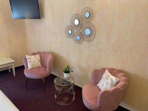 Hotels Le Grand Hotel : photos des chambres