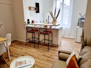 Appartements Meubles du chene vert, coeur de Jarnac : photos des chambres