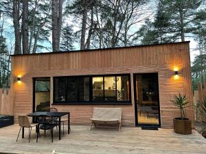 Bain de forêt - Lodges Cosy & Spa