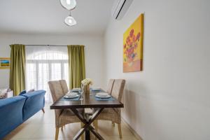 St Julians 2 Bedroom Apartment with Commanding Seaviews by ShortletsMalta