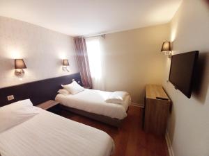 Hotels Kyriad Nimes Ouest A9 : photos des chambres