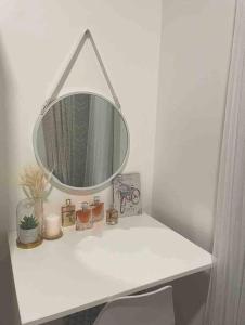 Cozy 1BR with balcony at Fame Residences