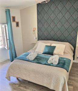 Appartements La mansarde d'Olympe : photos des chambres