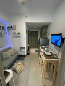 Cozy 1BR with balcony at Fame Residences