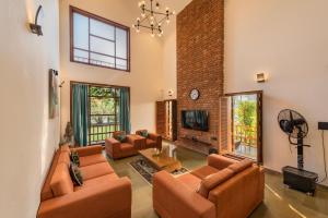 SaffronStays Happy Fields - Swimming pool farmhouse with farm views, hammocks & farm-to-table dining near Pune