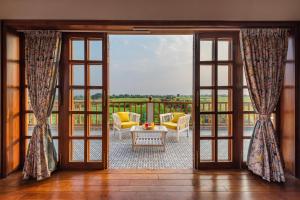 SaffronStays Happy Fields - 3BR pet-friendly pool farmhouse with farm views, hammocks & farm-to-table dining near Pune
