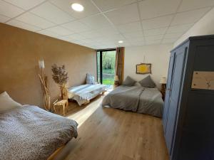 Appartements Holiday home on farm (La Ferme du Tao) : photos des chambres