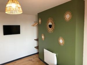 Appartements Au pied de la plage : photos des chambres