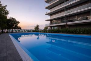 MyFlat Coral Beach Apartment