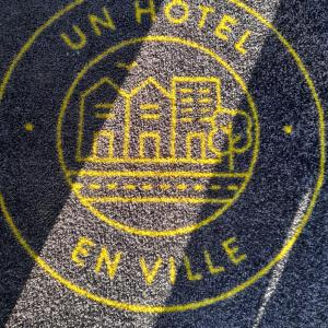 Hotels Un Hotel En Ville : photos des chambres