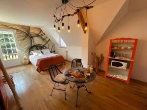 B&B / Chambres d'hotes Belle Chambre Double ORANGE Tout Bonnement Bien : photos des chambres